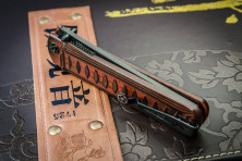 Ніж Kizlyar Supreme Whisper, сталь D2 Чорний титан, рукоять чорно-червона G10